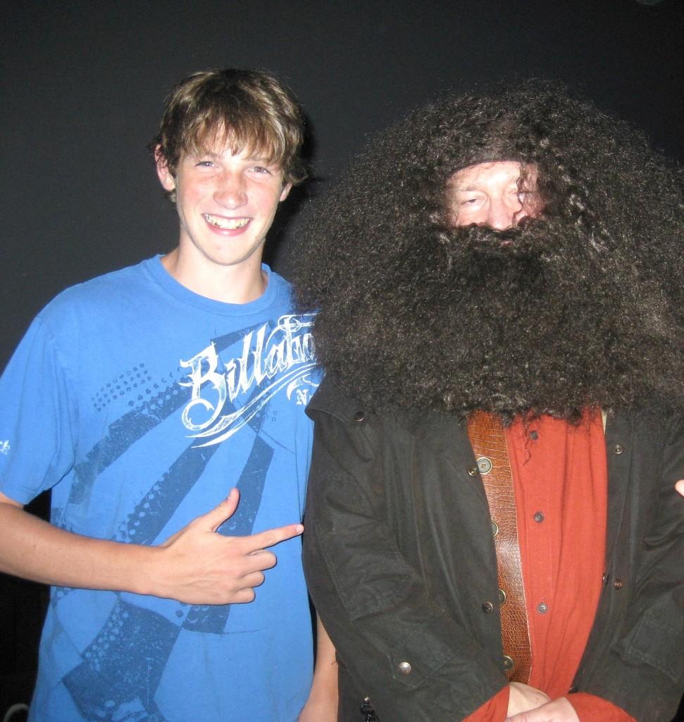 Junior Jonathan Pratt poses with a fan dressed like Hagrid at the midnight premiere of the movie.