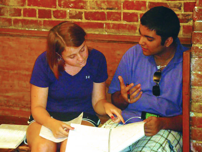 Junior Alexis Garretson tutors a student from Lahore, Pakistan in calculus. 
