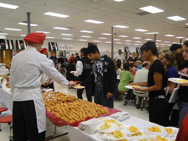 Students rewarded with honor roll breakfast