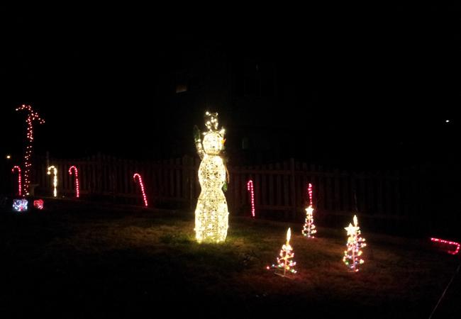 Melendez decorated her yard with snowmen and candy canes. 