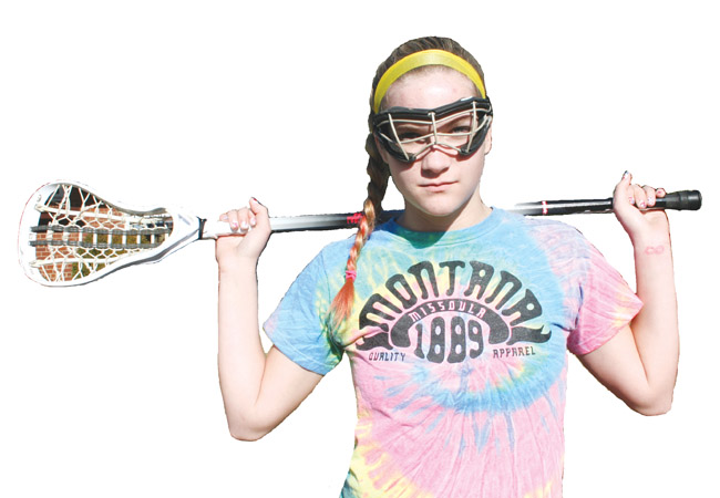 Junior Lizzie Manthos earned a sport of the varsity lacrosse team despite this being her first year playing.
