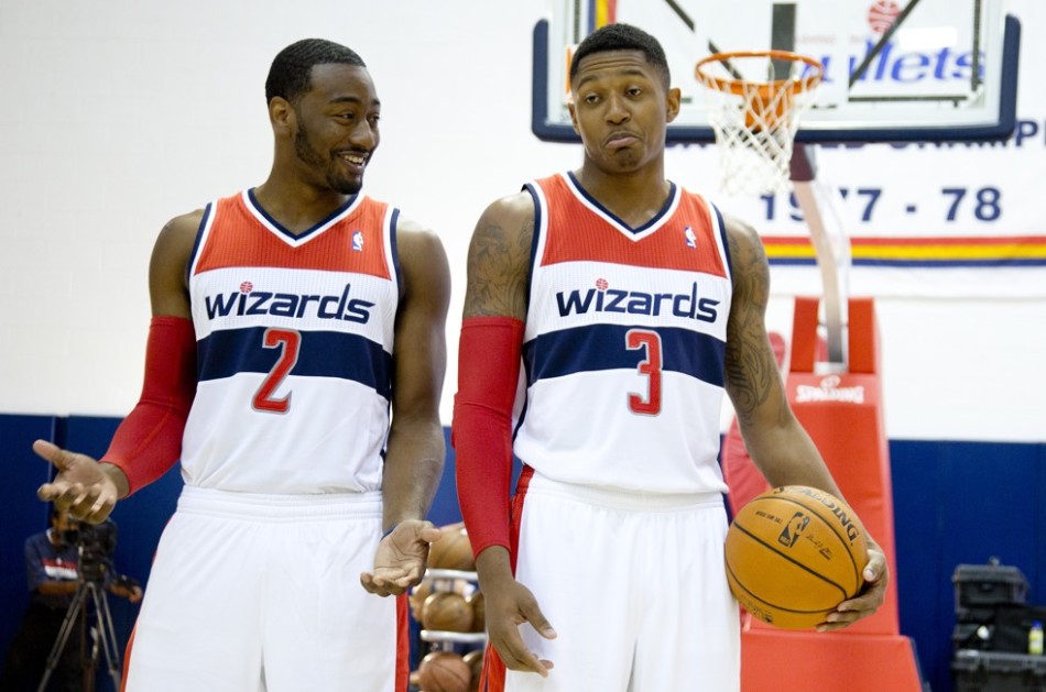 Beal and Wall talk during pre-game practice.