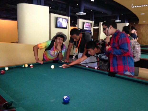Junior Jeffery Montano takes some time away from the books and shoots pool during his lunch break with his friends.
