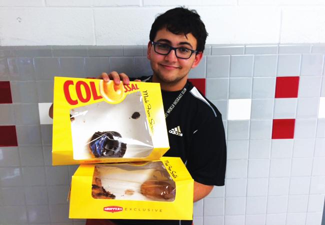 Senior Rasel Abutaa, also known as the doughnut guy,  drives a hard bargain by selling his pastries for $2. 