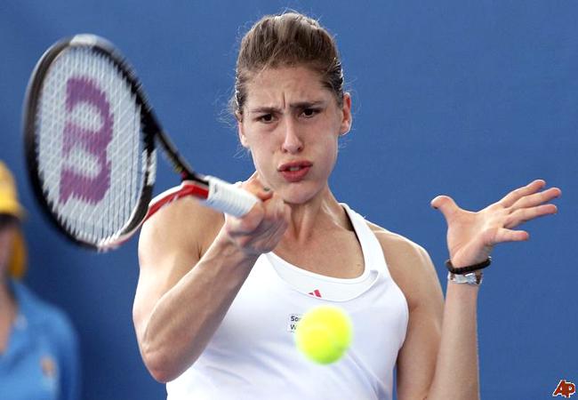 Andrea Petkovic often wears sleeveless shirts when she plays tennis.