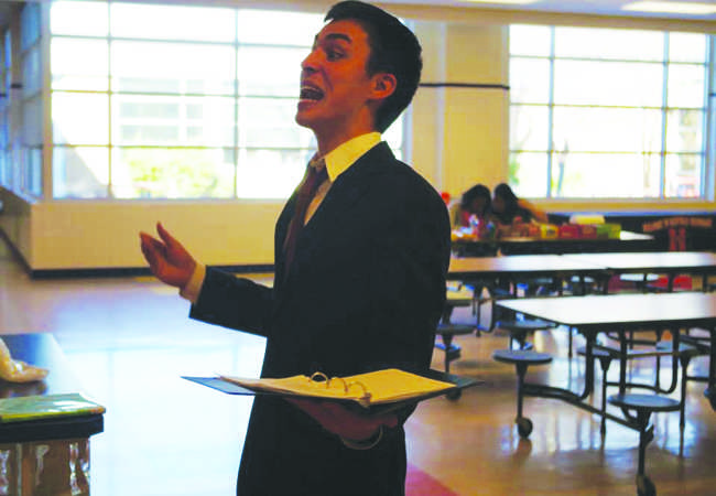 Hendrickson practices one of his speeches before competition.