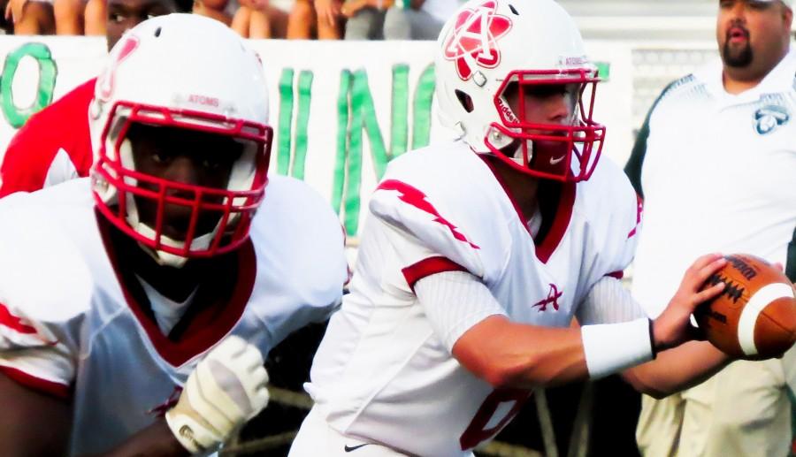 Annandale football players, Tim Johnson and Tucker Mack, in a 2014 football game