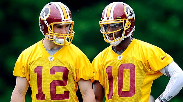 ASHBURN, VA - MAY 06: Robert Griffin III #10 and Kirk Cousins #12 of the Washington Redskins talk during the Washington Redskins rookie minicamp on May 6, 2012 in Ashburn, Virginia. (Photo by Patrick McDermott/Getty Images)