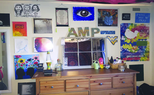 The wall of art as Perez calls it, consists of posters and paintings along with personal decorations, such as her initials in wooden letter blocks. "I get compliments on my wall because there's always something to look at. Most of the stuff on my wall means a lot to me," Perez said. "I have paintings from friends, posters from different concerts of my favorite artists and some inspirational quotes for everyday reminders."