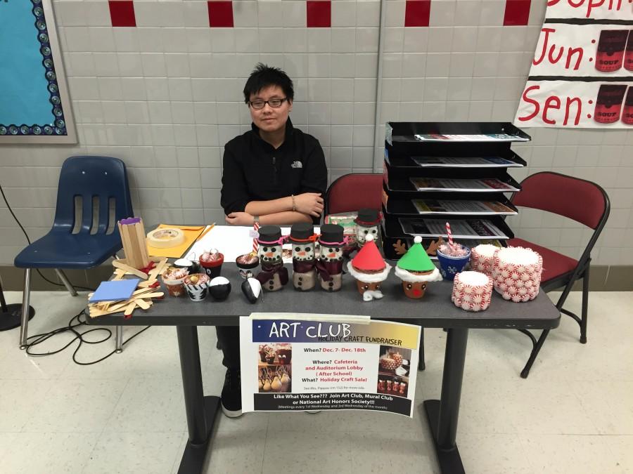 Senior Vincent Vo running the fundraisers table during the lunch period.