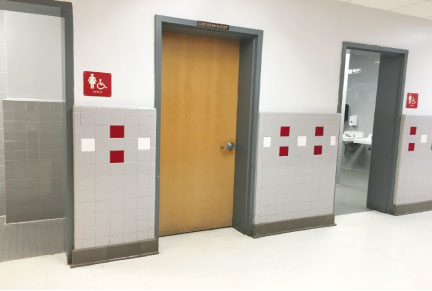 The girls and boys bathrooms located in the main hallway.