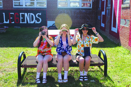 Students dress as tourists or in tropical clothing