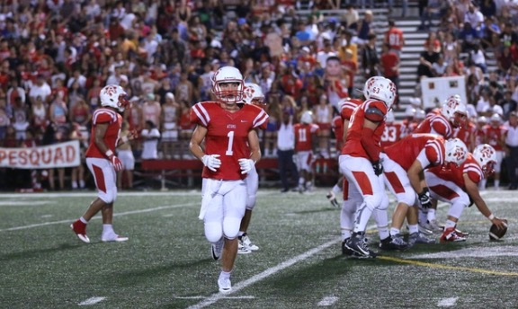 Junior Jack McCrossin lines up at the line of scrimmage for a play. 