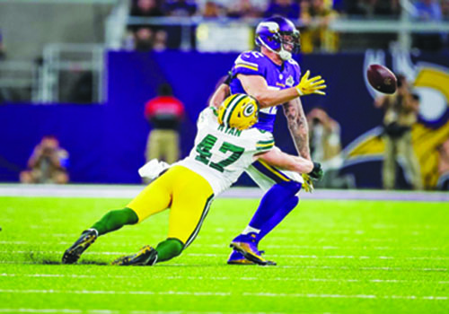 Linebacker Jake Ryan tackles a Viking in a 14-17 loss for the Greenbay Packers.