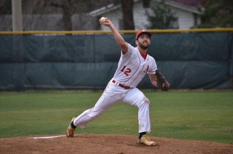 Sophomore Alex Brennan pitches during the game against the Lee Lancers on April 1. 