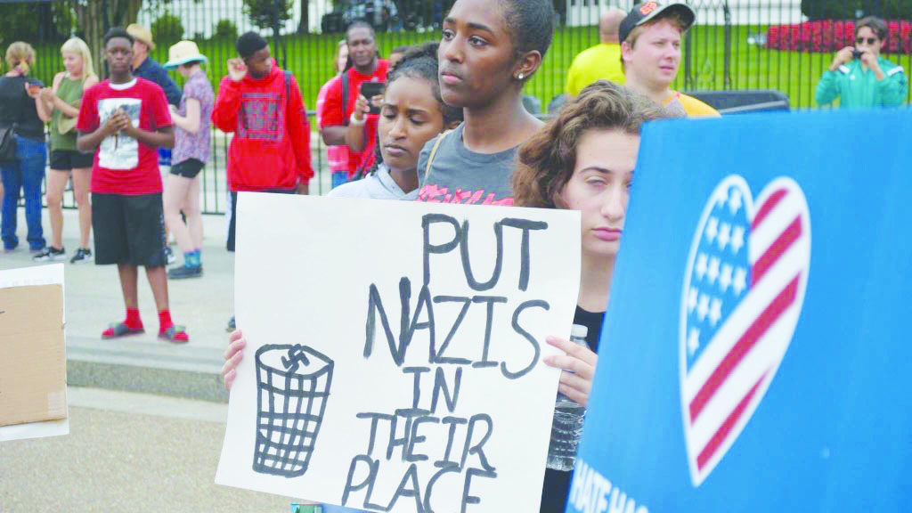 Mayada Hassan (center), a Stuart senior, protests at the “Reject White Supremacy” in Washington D.C. to fight back againt racism in the wake of Charlottesville rally. 
