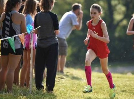 Freshman Julia Ghiselli runs at the Great Meadow Invitatational at Colgan High School in The Plains, VA on Sat. Aug. 26, where she finished in 2nd place.