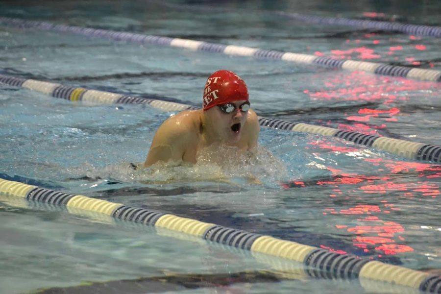 Sophomore+Jack+Dalrymple+swims+the+100+yard+breaststroke+at+Lee+District+Rec+Center+in+a+tri-meet+against+Chantilly+High+School+and+Edison+High+School.