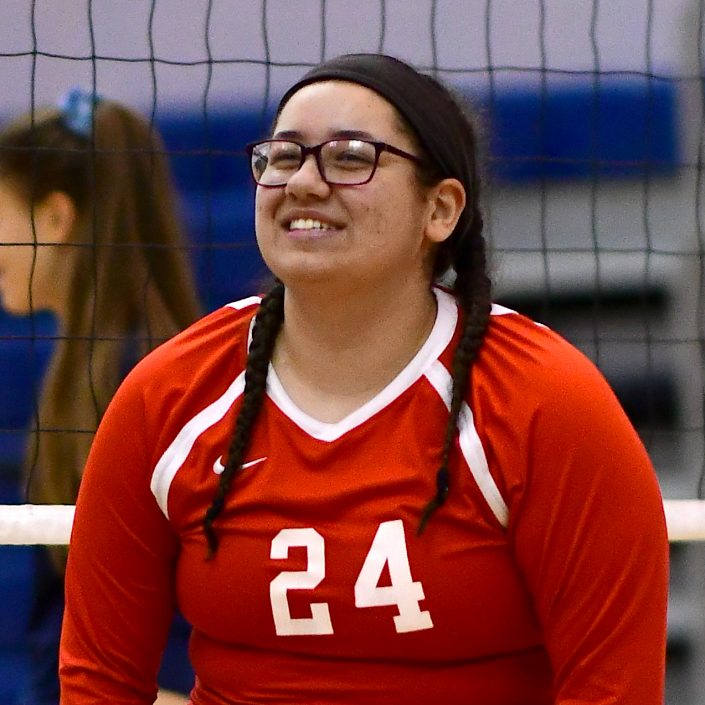 Senior Zain Ghul participates in a volleyball game as a part of the Atoms varsity team.