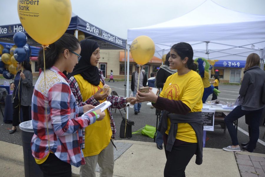 Junior Christine Trieu, Junior Aiya Ismael and Junior Shafia Khan all volunteered at last year’s Taste of Annandale.