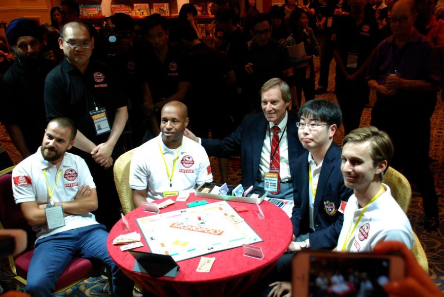 Valentine with the four world championship finalists and Monopoly judge, Phillip Orbanes in 2015.
