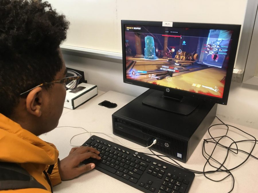 Junior Kaleab Mengistu enjoys a game of Overwatch on PC. 
