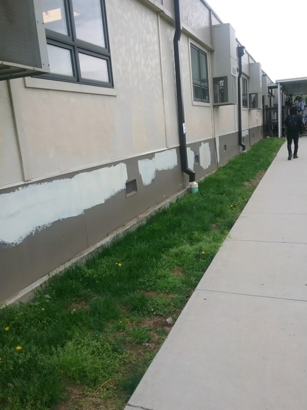 School administration painted over the vandals drawings on the modulars.