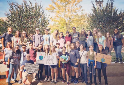 School Board member Ryan McElveen with FCPS students at the climate change protest in Washington, D.C. last month.