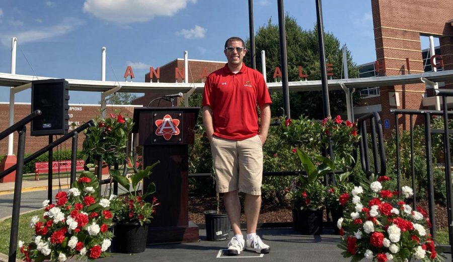 Mazzarella poses on the stage of this years modified graduation celebration.