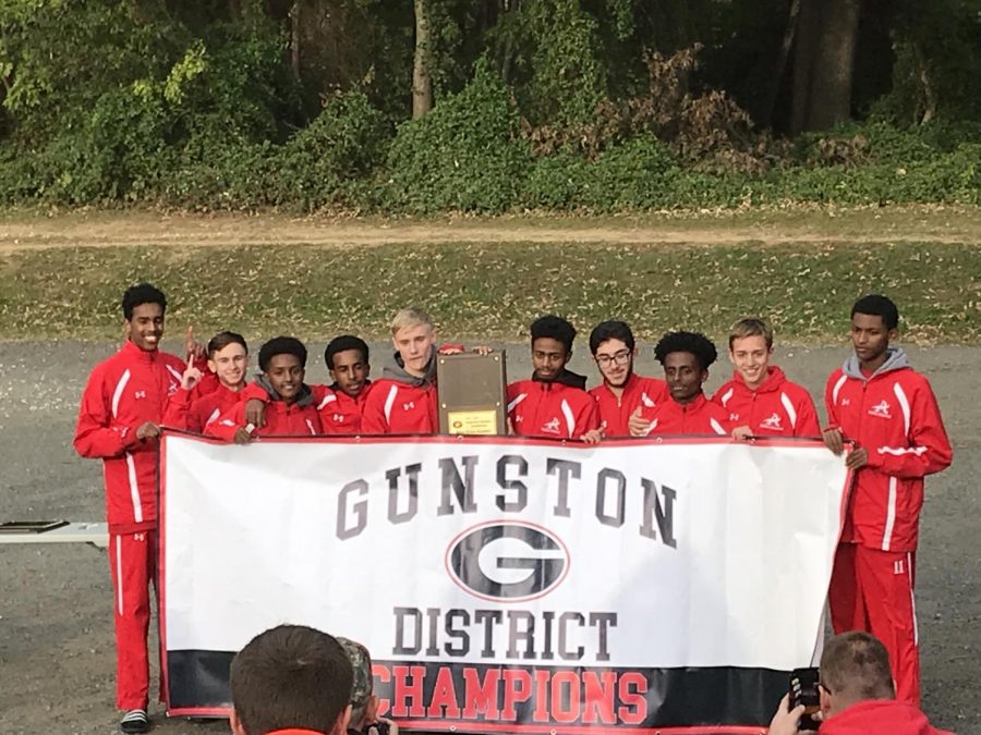 Boys cross country celebrates a district championship in 2018