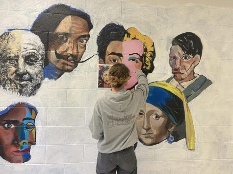 Artists start mural renovations