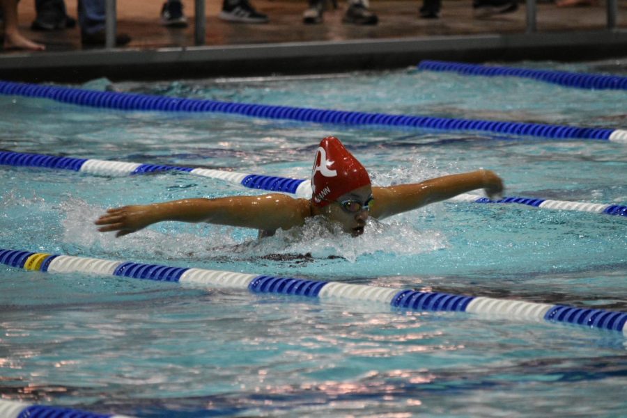 Junior+Maya+Mann+competes+in+the+100+yard+butterfly+event+in+a+meet+against+the+Hayfield+Hawks+on+Dec.+10.+The+Atoms+girls+and+boys+teams+both+won+by+scores+of+154-149+and+203.5-104.5.