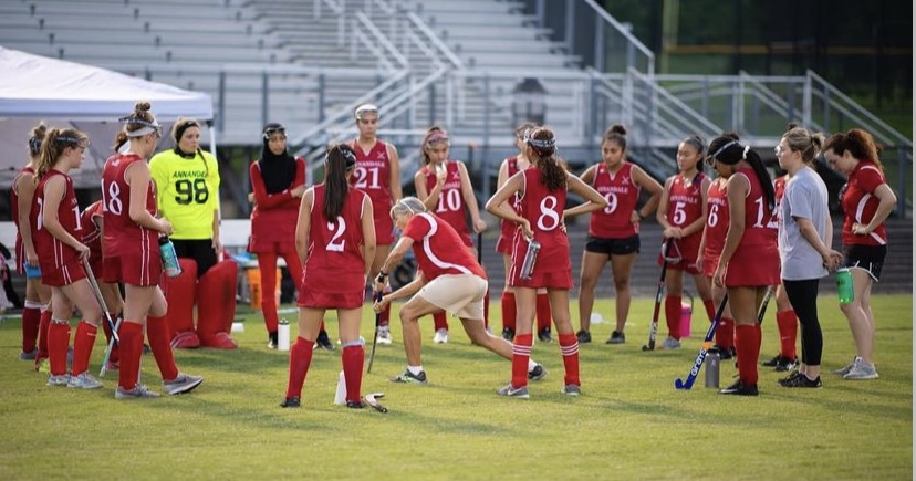 Hook demonstrates skills for the field hockey team. “Their determination, willingness to work hard, and positive “team first” attitude earns us “WINS” every day-in the classrooms and on the field. That is the real “Winning Tradition” of Annandale HS,” Hook said.