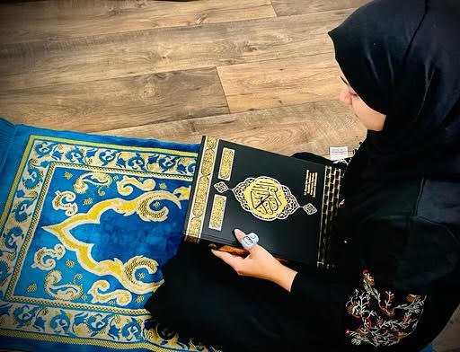 Sophomore Khujasta Basiri prays with her mat and reads the Quran 5 times a day.