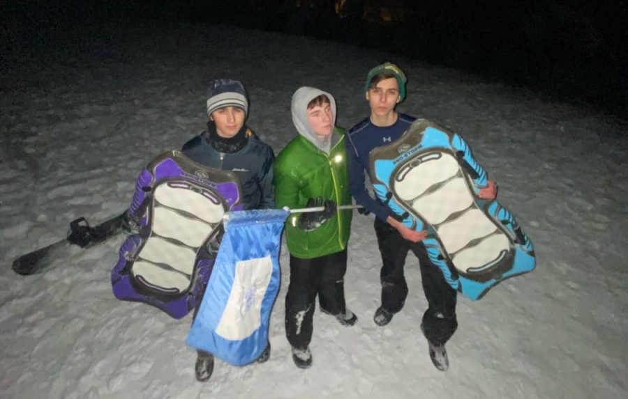 Seniors+Armen+Boghosian+and+Evan+Burita+pose+with+class+of+2021+graduate+Nareg+Boghosian+as+they+enjoy+their+2021+snow+day+with+some+sledding+and+snowboarding.