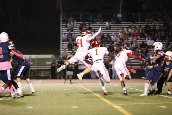 Senior Kevin Tieu block a kick to prevent the Justice Wolves from scoring in their game on Friday, 10/6