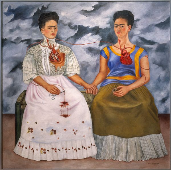 One of Frida Kahlo’s infamous painting, ‘The Two Fridas’, potraying two Fridas interlinked by their hearts.