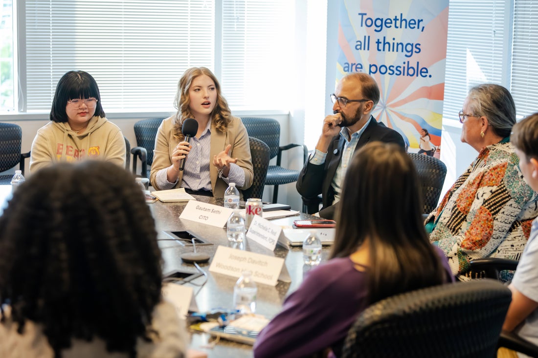 Senior and Co-Editor in Chief Zoe Ligairi asks Superintendent Dr. Michelle Reid about AI policy development at the second-annual student journalist roundtable.