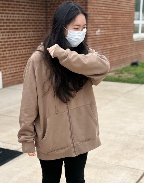 Sophomore Cherry Ha wears her face mask to combat her pollen allergies.